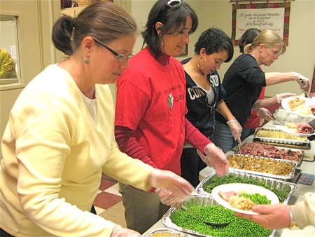 Volunteer to help feed the hungry at a food kitchen