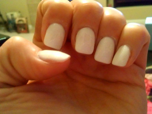 Paint your nails a light color that black will show up on