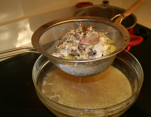 Homemade full bodied seasoned chicken soup broth.
