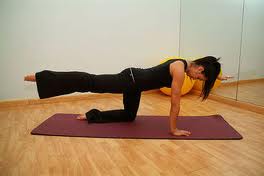 Balancing on an opposing leg and arm, raise the other leg and arm. Alternate sides and do it 15 times. Builds the core and trains balance.