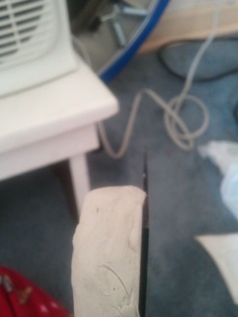 Make sure the clay is not going under the glass if placed at a corner.