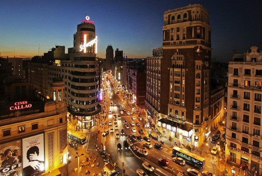 Gran Via by night. Ballesta street is a stone throw away on the right hand side of this image.