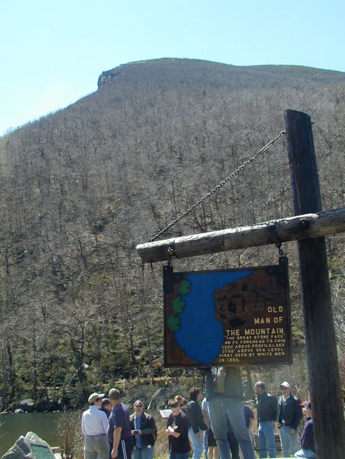 The peak where the Old Man's face once gazed upon the valley below before his great fall.