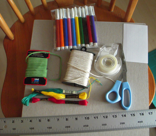 Plain cotton kitchen string works well, is inexpensive, and is easy to handle.