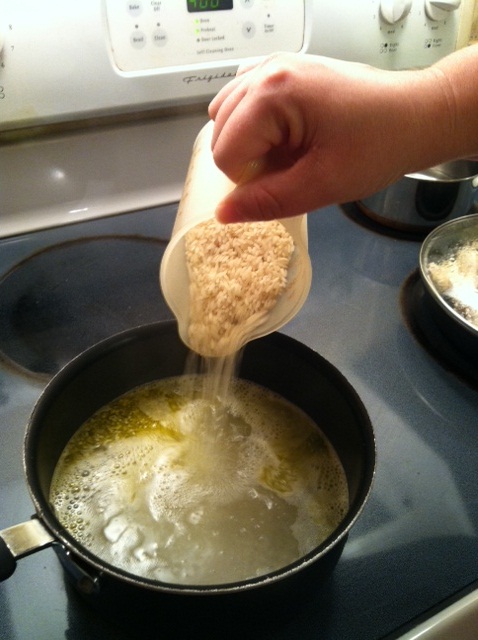 Pour rice into boiling water. Credit: Chase Snoke