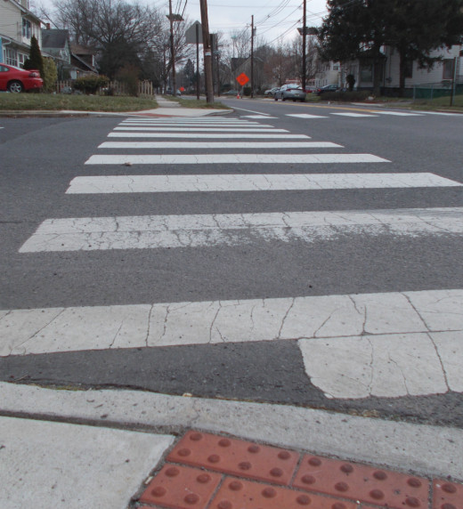 Crossing at a crosswalk can be dangerous, no matter what the law says.