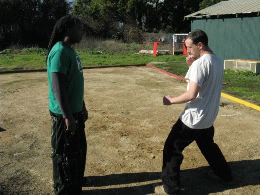Glenn and Jamie demonstrate a Kenpo technique called Thrusting Salute.