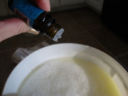 Putting several drops of essential oil into mixture
