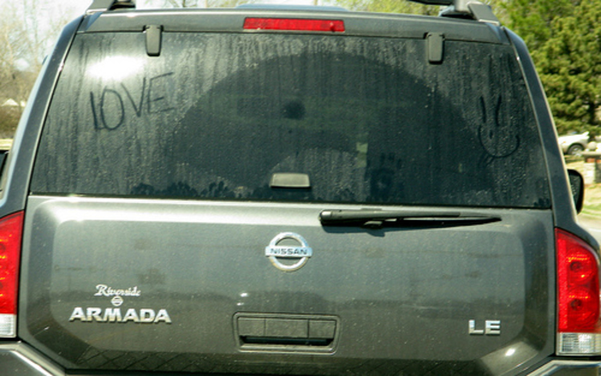 Love in the air--even on a dirty car. 