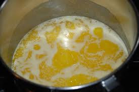 First melt the butter in a large stock pot.