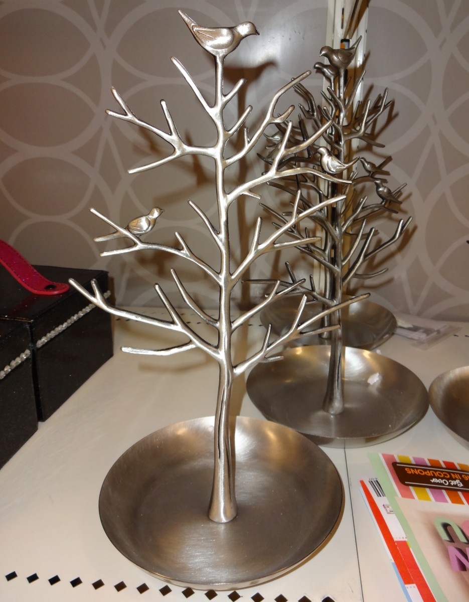 If you're buying any jewelry or if your mom already has a lot of jewelry, this tree will hold and display it for her.