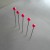 Insert pins on a quilling board Insert pins on a quilling board