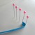 Make first loop around first two pins Make first loop around first two pins