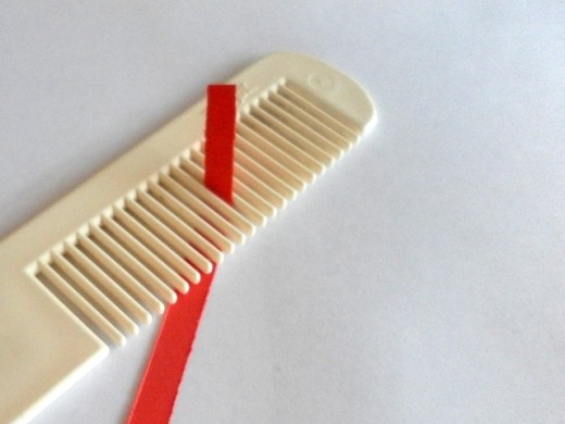 Comb and quilling paper