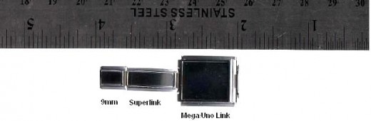 visual of 9mm Italian charm link, megalink and superlink next to a ruler to showcase size in millimeters and in inches