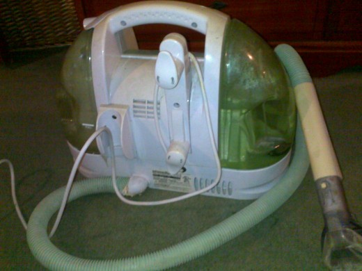 I use a small steam cleaner that works great and is easy to clean out afterwards.