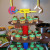 Football shaped cupcake tower loaded with cupcakes