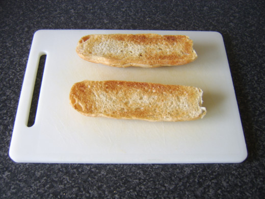 A fresh sub roll is lightly toasted