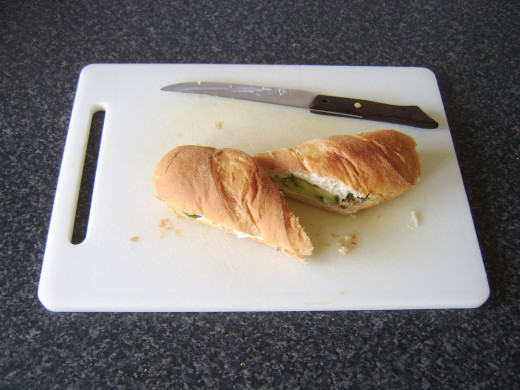 The sub roll is cut in half to serve