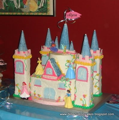 One of my more complex cakes, a few years after I started. (everything, but princesses and flag, are edible)