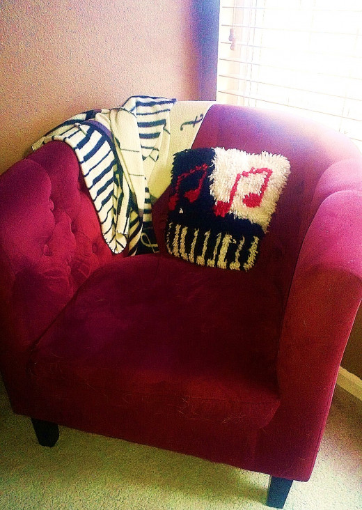 For years, I didn't have a front window. So now that I do, this is my favorite place in the house. I read my Bible here, play guitar and sing praises to God. Love my red Mommy chair!