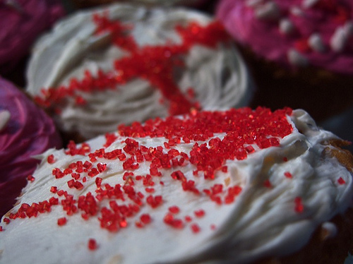 Red sprinkles and white icing
