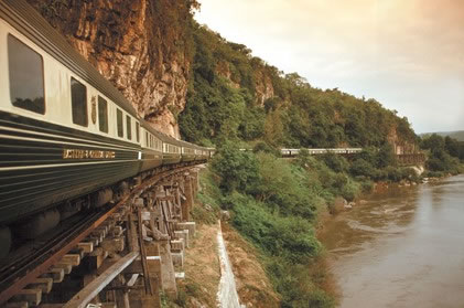 Eastern and Oriental Express offers scenic rail journeys in South East Asia crisscrossing luxh rainforests and picturesque landscapes