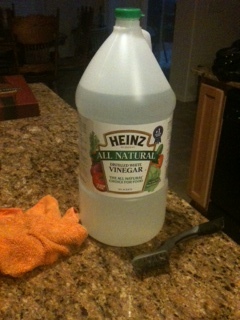 Buy white vinegar in large bottles