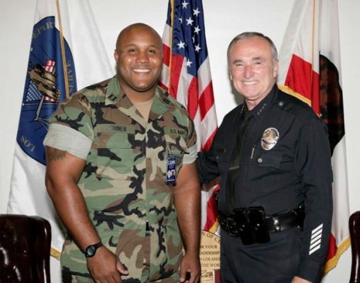 William Dorner posing with Police Chief William Bratton