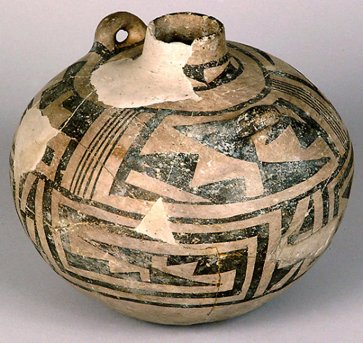 This is an Anasazi canteen (pot) excavated from the ruins in Chaco Canyon, New Mexico. It was created between 1075 and 1300 AD.
