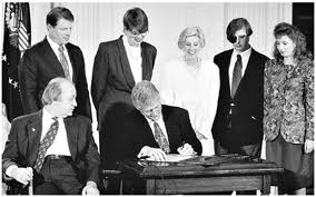 Clinton signs the Automatic Weapons Ban of 1994-2004.