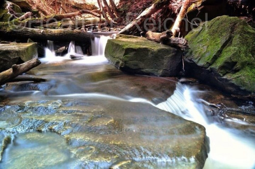 To shoot slow water during the day, you need to create artificial night