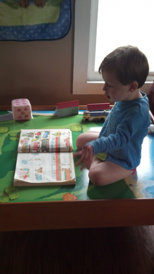 You will see this again later in this article. He likes this book more now than 4 months ago when I took the first picture of him with it.
