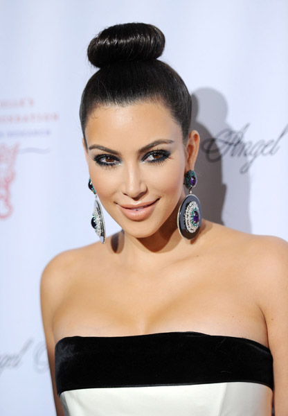 Kim Kardashian rocking a high bun.