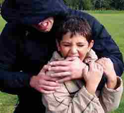 www.xtremekravmaga.com  Child learning self defence techniques. Simple as biting. 