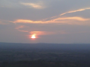 Love is....watching the sunset together.  This photo was taken from an overlook above Cañas Dulce, north of Liberia.