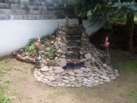 My mother and stepfather turned an old set of cement stairs into a beautiful waterfall!