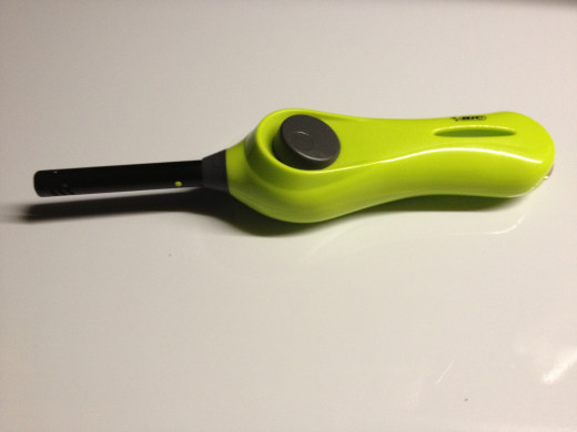 Long handled lighter. Trust me on this one