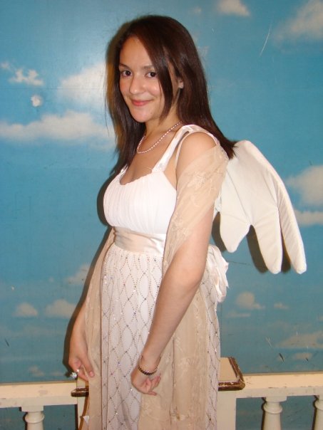 My sister wearing these wings to her senior prom.
