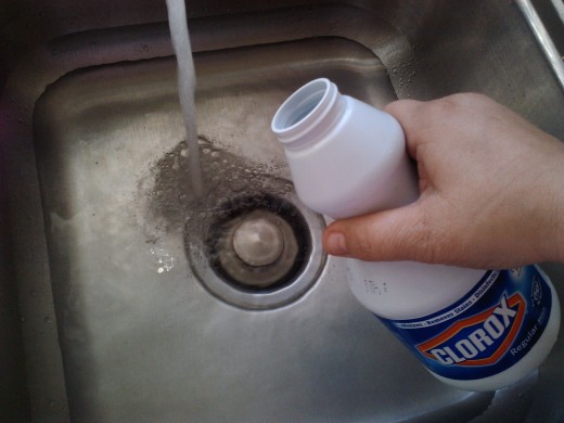 3 Tablespoons of bleach in a sink of water helped to tget the stains out of the shade.