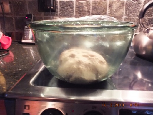 As soon as it came out of the refrigerator, I folded the dough a few times over itself and it will rise again.