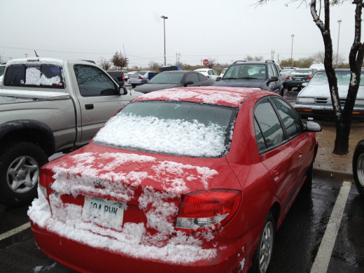 My Kia covered with snow.