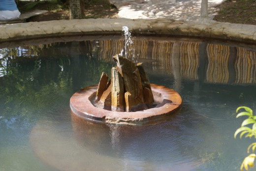 A quiet pool in a hot springs crater, Las Hornillas, Miravalles Volcano.