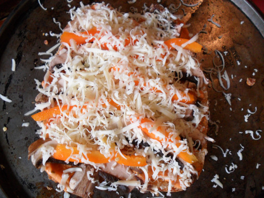 Top your pizza with cheese