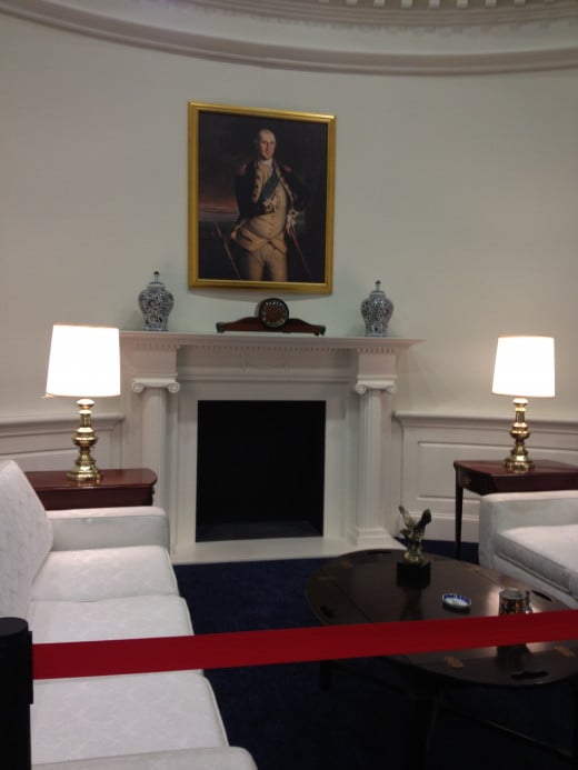 The Fireplace and sitting area of the Oval Office. 