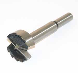 A forstner bit, useful for creating cavities in soft materials.