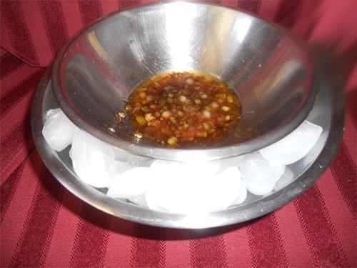 cool gastrique on bed of ice