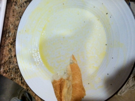 A plate that just had, some lemon, peppers, butter and light cheese is just sitting there ---- Duh!