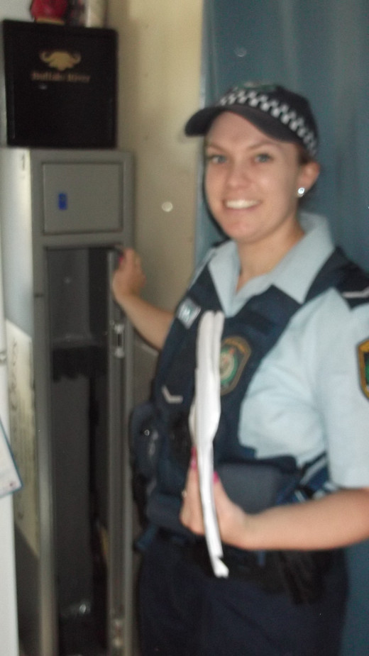 One happy police officer after emptying our gun safe and matching all serial numbers. Two happy gun owners!