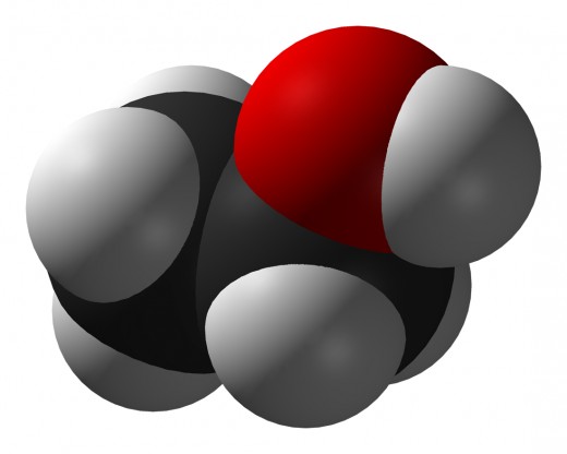 The alcohol molecule. The red side represents the part of the molecule (an oxygen/hydrogen group) that makes it an "alcohol" from a chemistry point of view. The other side of the molecule is a short carbon/hydrogen chain.